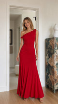 Front view of model wearing a red one-shoulder ruched maxi evening dress