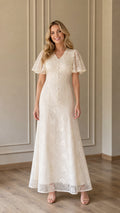 Front view of Ivory lace maxi dress on model