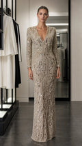 Front view of champagne sequined long-sleeve evening gown
