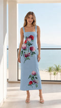 Front view of model wearing Light Blue floral midi dress