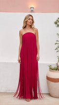 Full front view of strapless fringe maxi dress in vibrant magenta