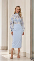 Front view of light blue floral blouse and skirt set