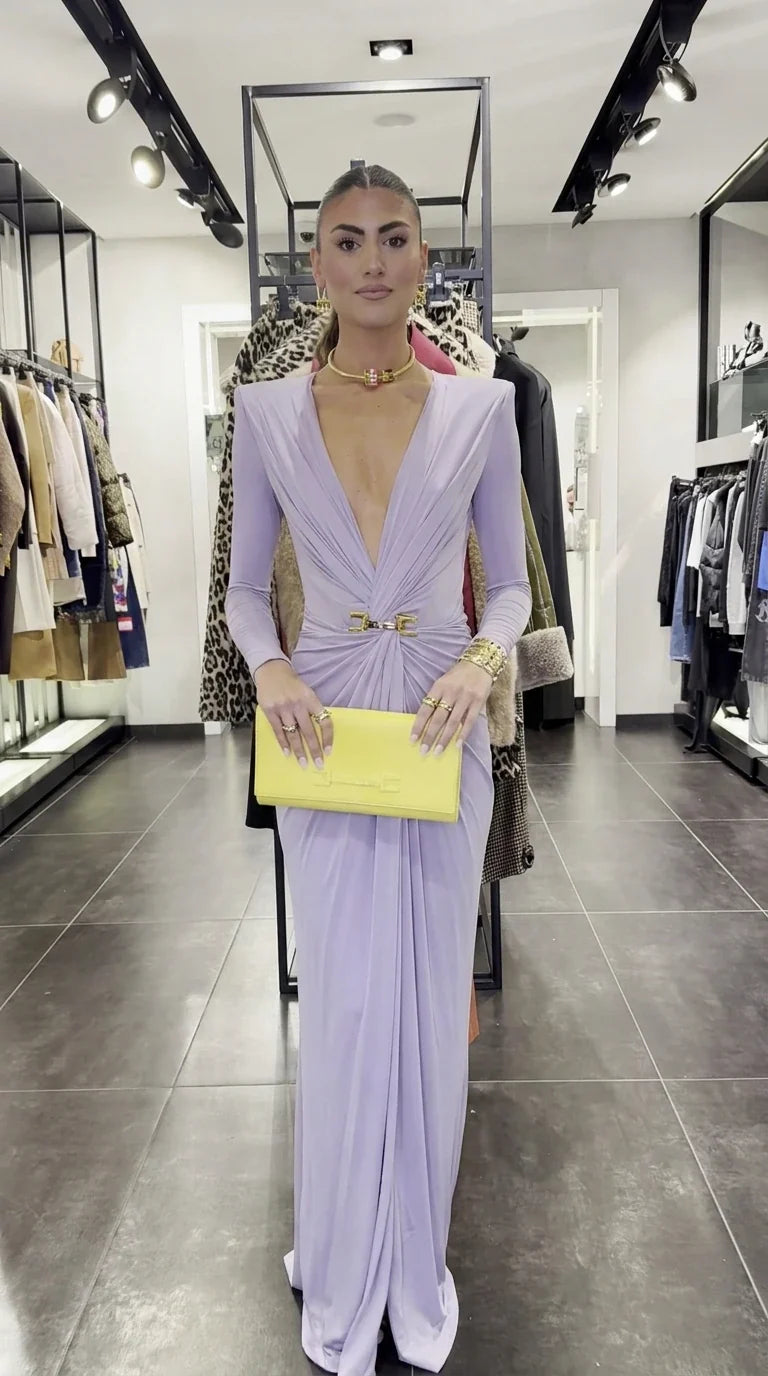 Front view of lavender long-sleeve maxi dress with gold belt accent