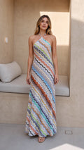 Front view of model wearing multi-color chevron knit halter maxi dress