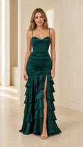 Emerald green satin corset maxi dress with tiered ruffle skirt front view