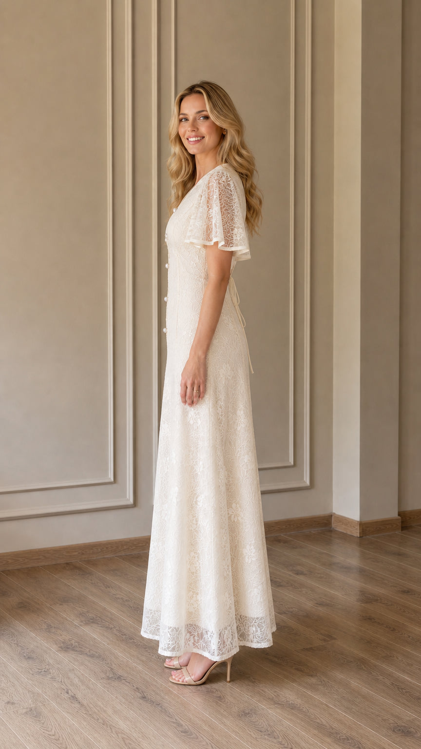 Side profile view of Ivory lace maxi dress