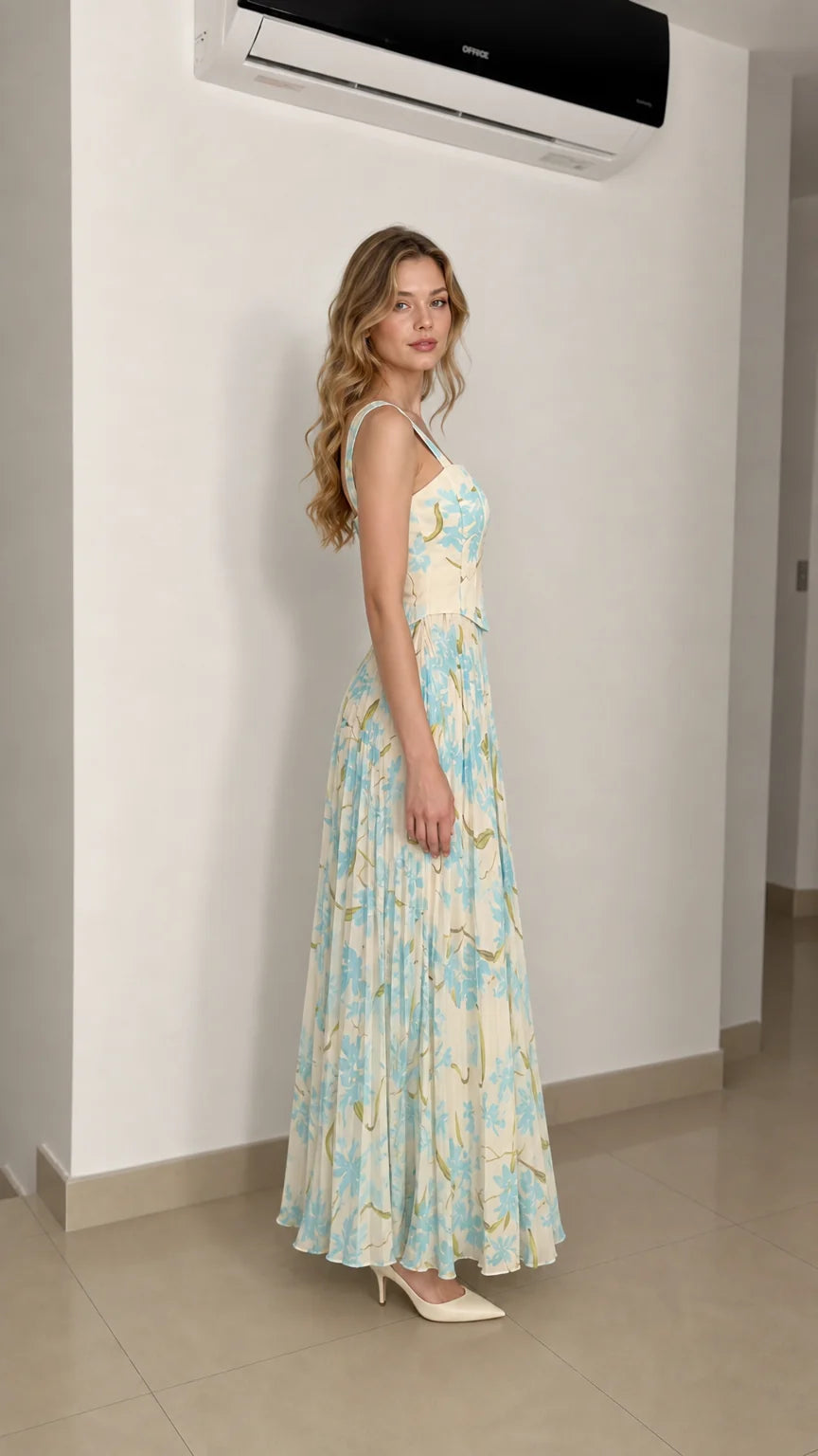 Model wearing ivory floral maxi dress from the side
