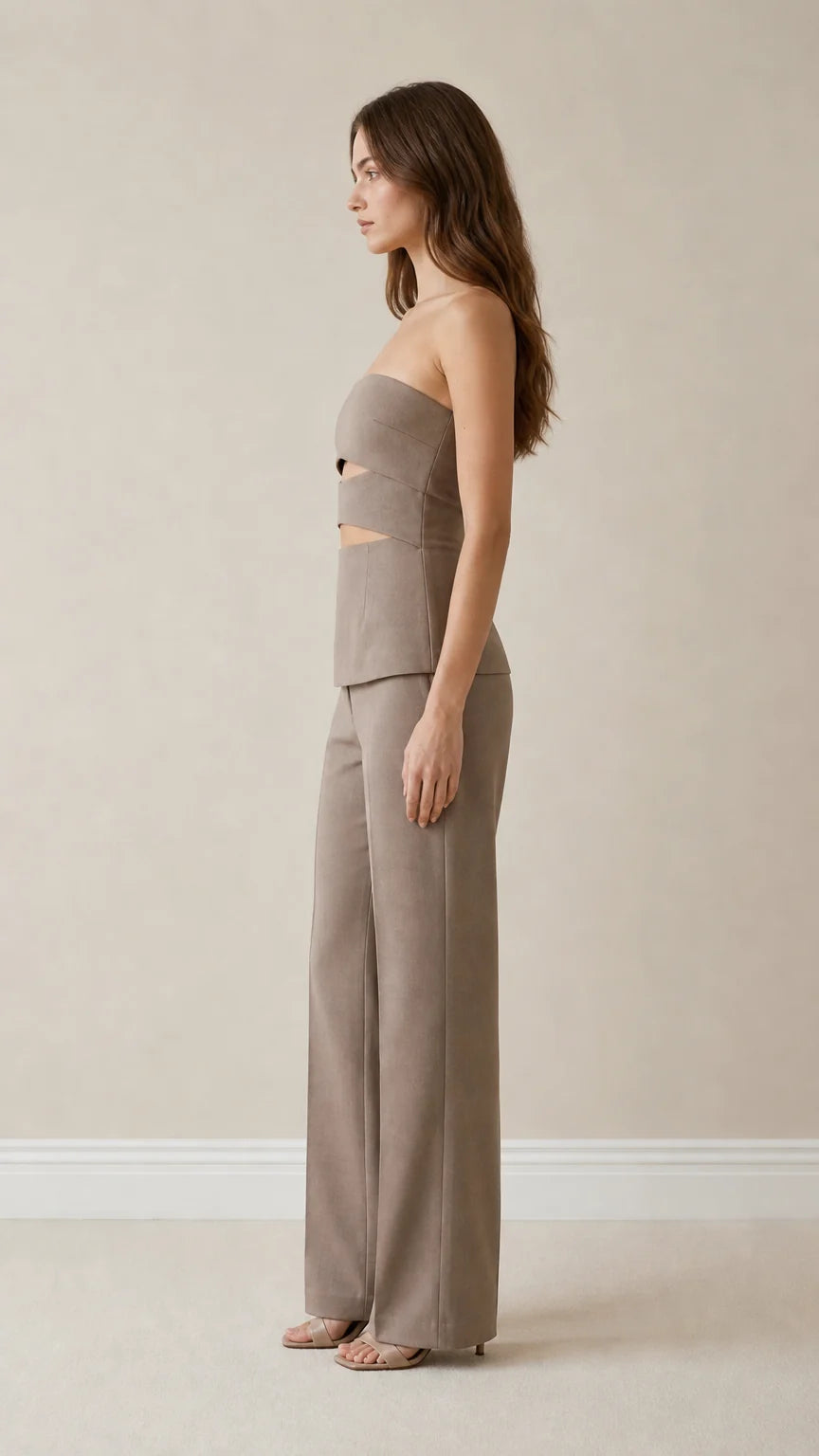 Side profile view of taupe pant set