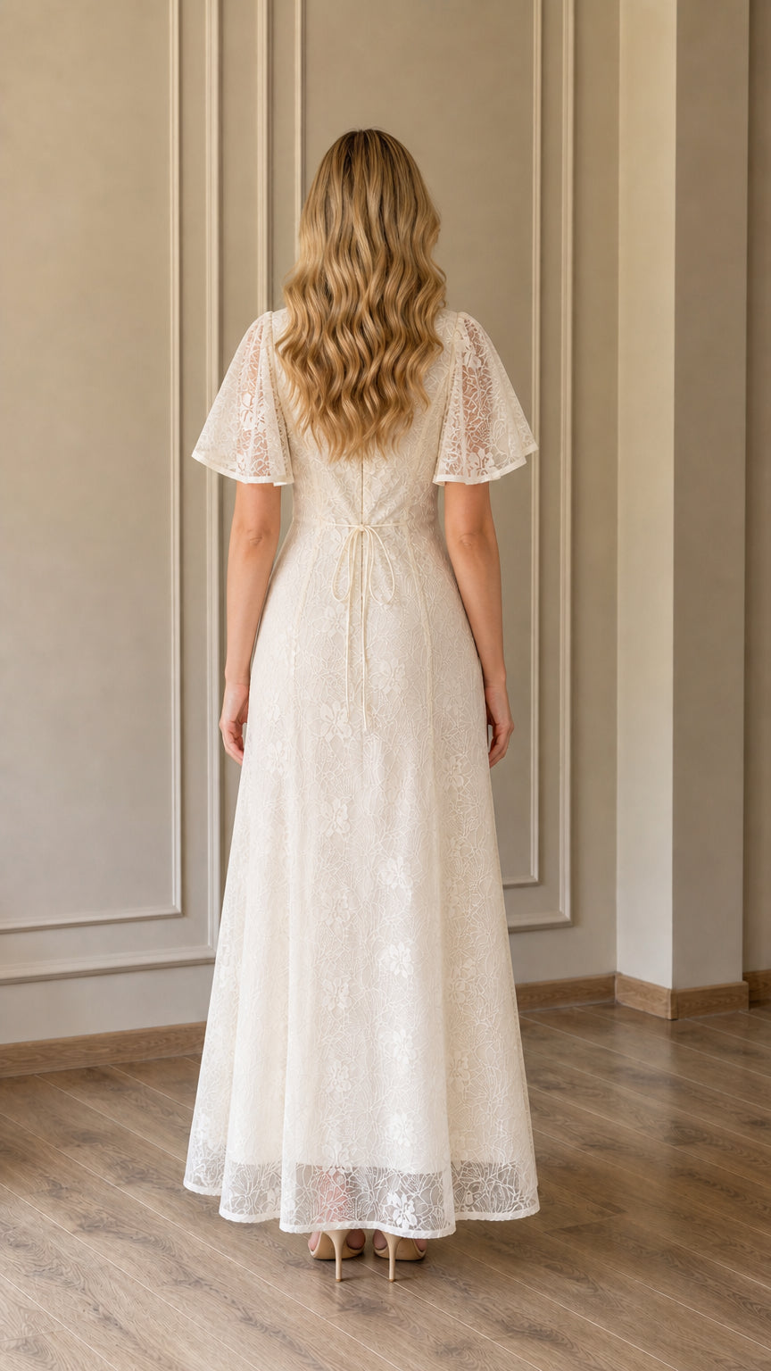 Back view of Ivory lace maxi dress showing flared sleeves