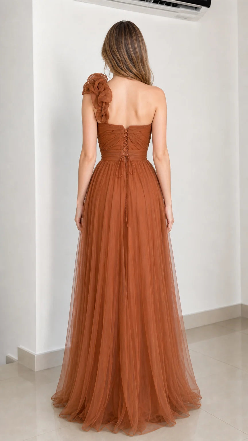 Back view of rust brown tulle evening dress showing lace-up detail