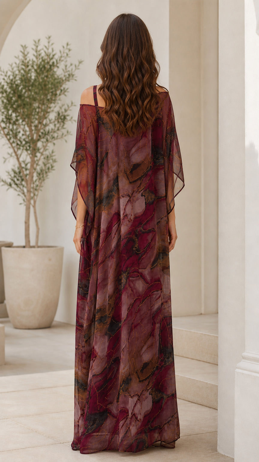 Back view of burgundy sheer overlay draped maxi dress