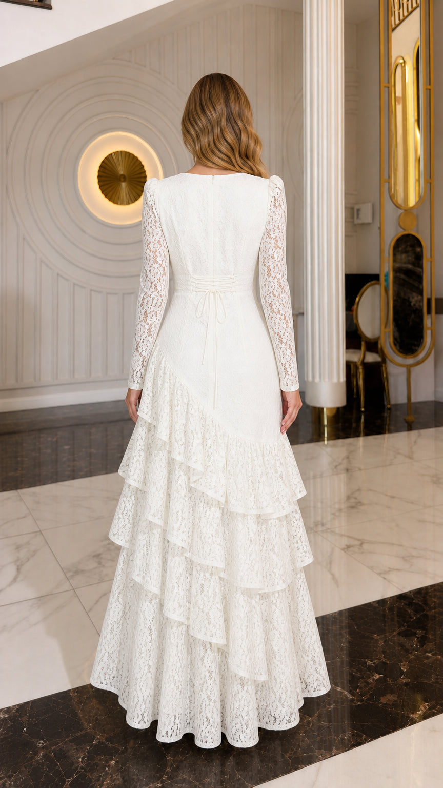 Back view of model wearing ivory long-sleeve lace evening gown