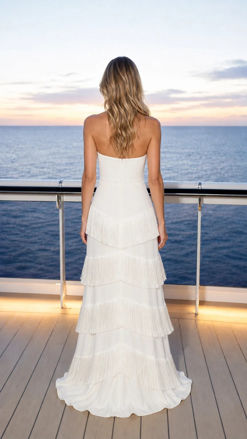 Back view of white strapless evening gown