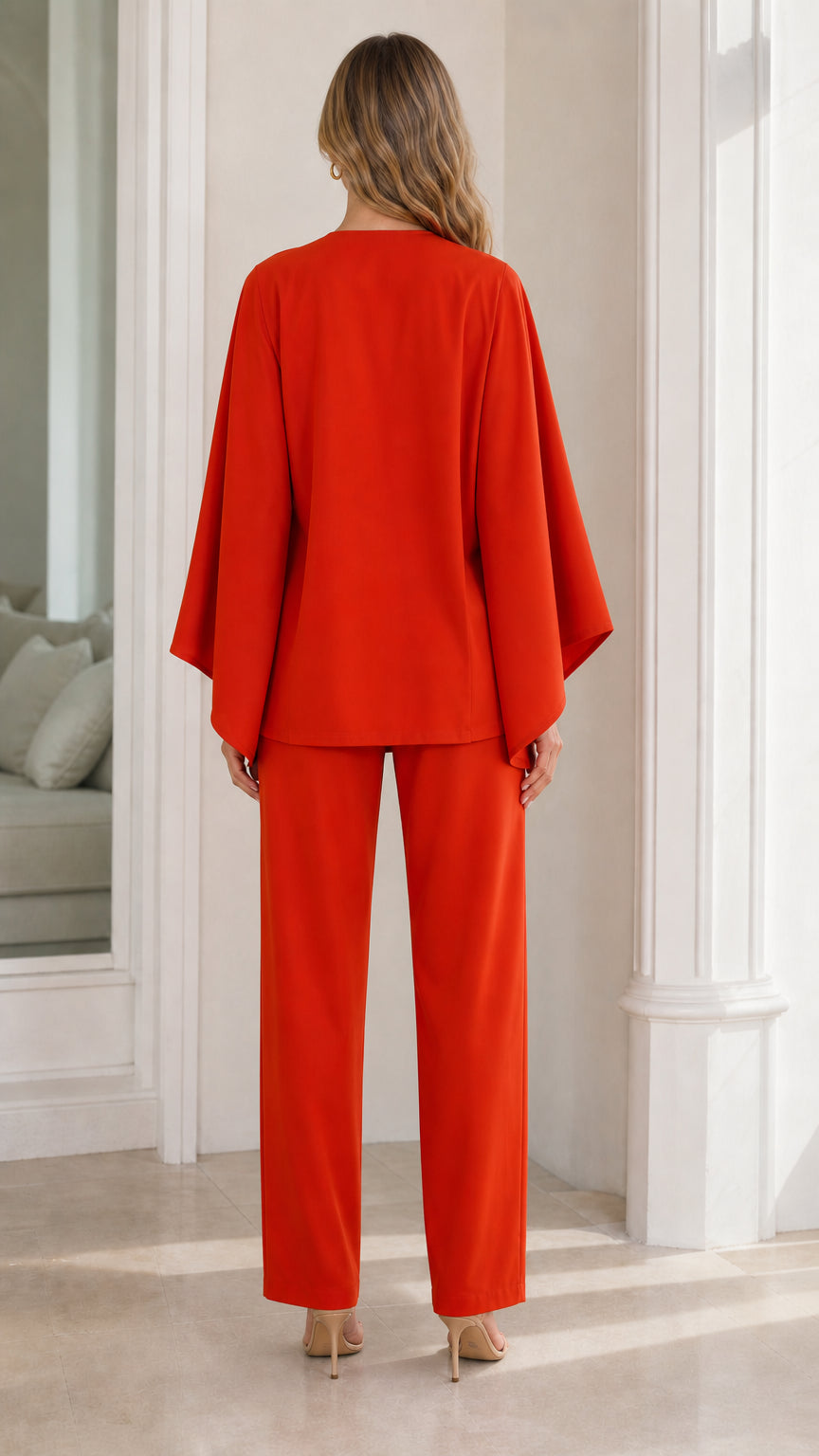 Back view of model wearing burnt orange matching two piece set