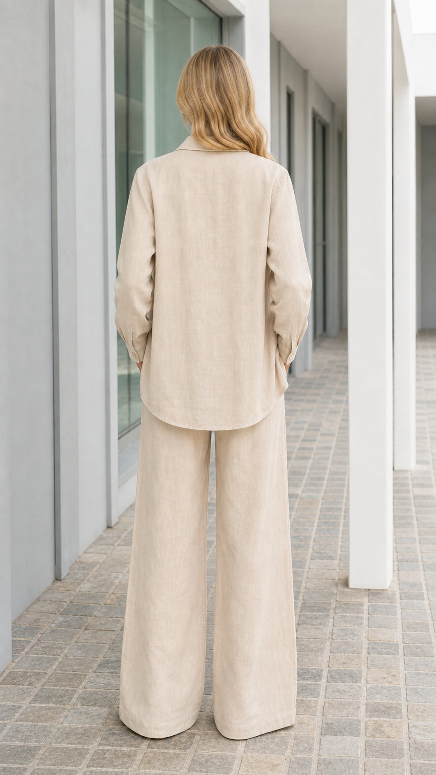 Back view of woman wearing beige linen blend outfit