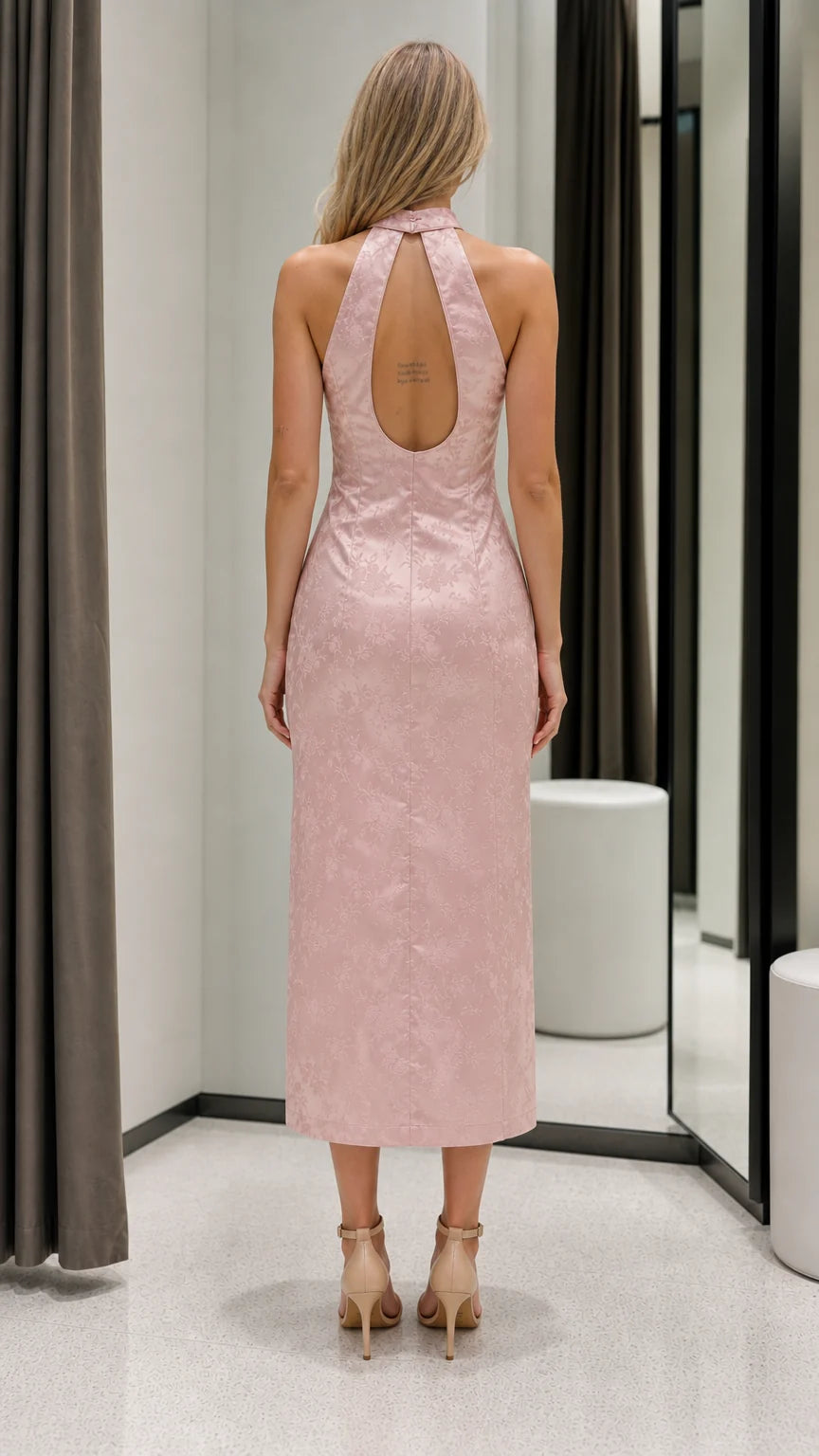 Back view of pink halter dress showing keyhole detail