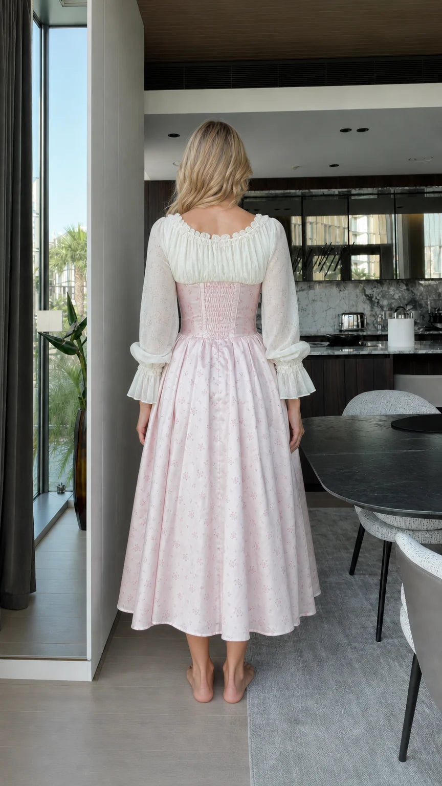 Back view of model wearing pink vintage corset midi dress