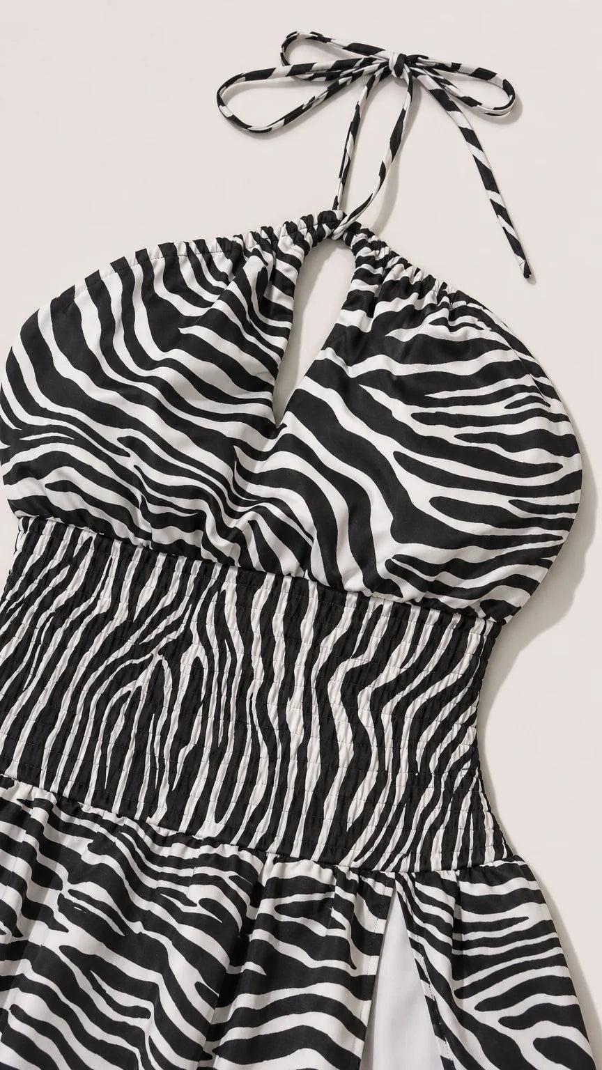 Close up of bodice and halter tie detail of zebra print dress