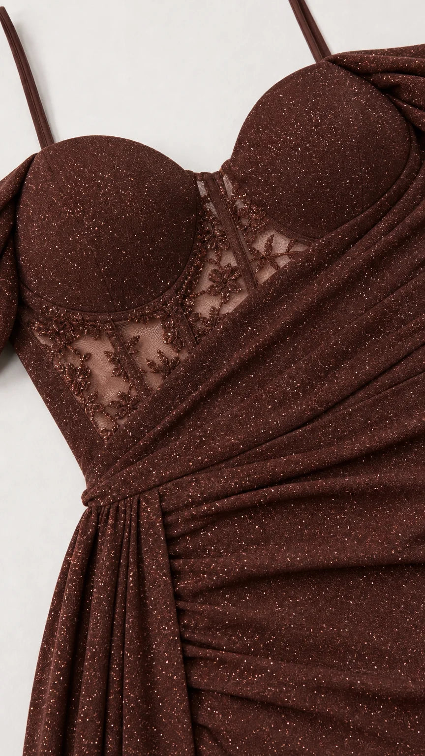 Close-up detail of sweetheart bodice, sheer lace waist, and draping