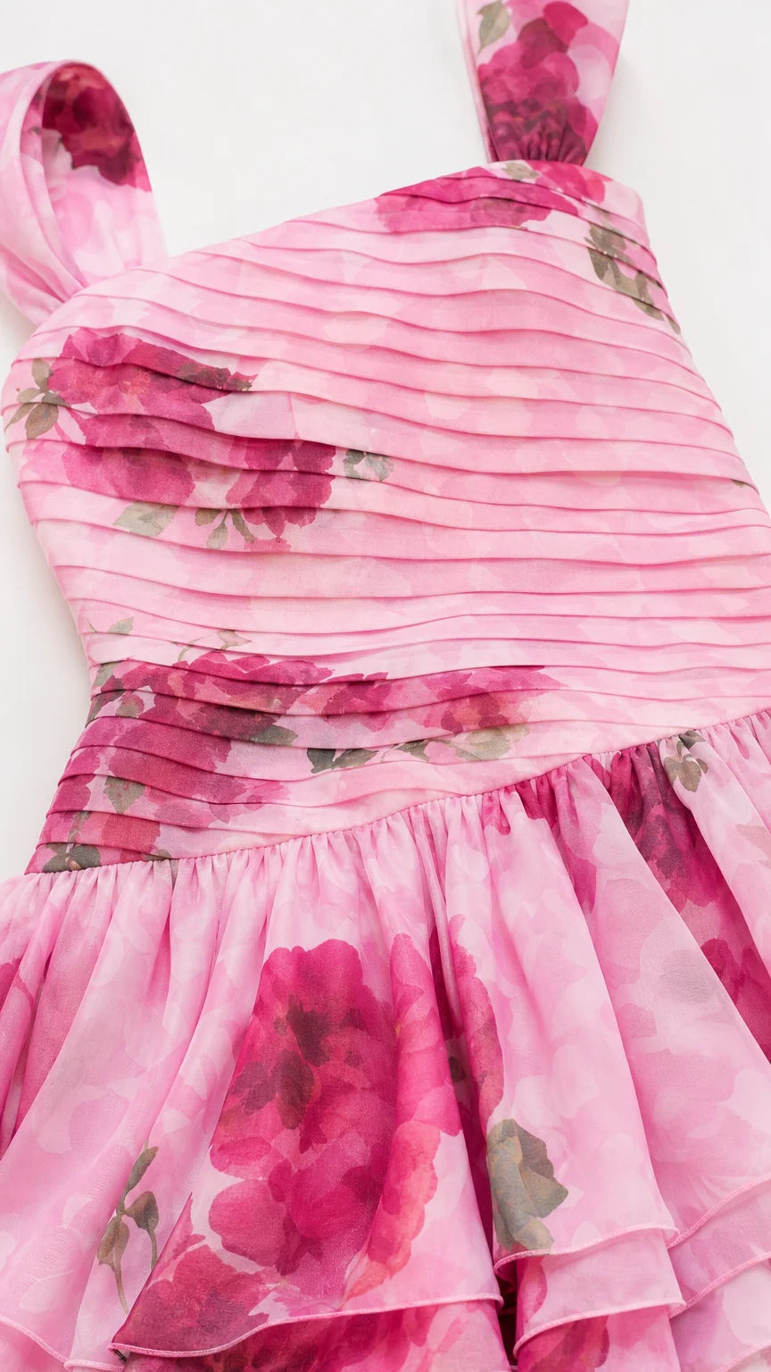 Close-up detail of pleated bodice and floral fabric