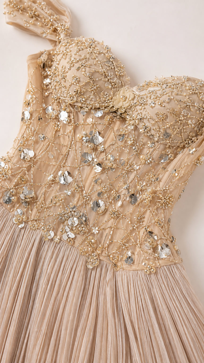 Close-up detail of beaded corset bodice with rhinestones