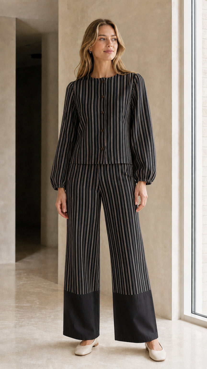 Woman wearing black striped matching set