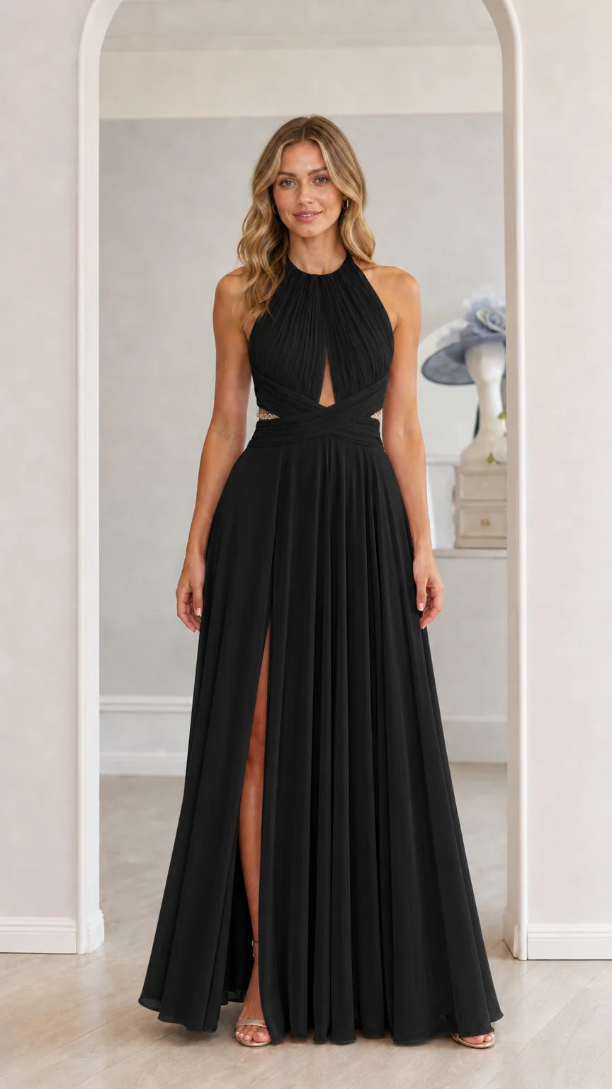 Model wearing black chiffon halter maxi dress with front slit