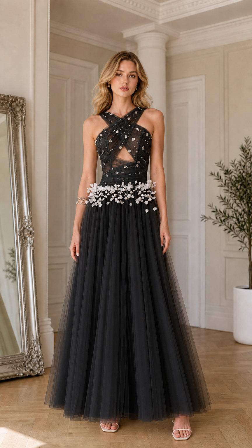 Black criss-cross halter tulle evening gown with white 3D floral waist embellishments
