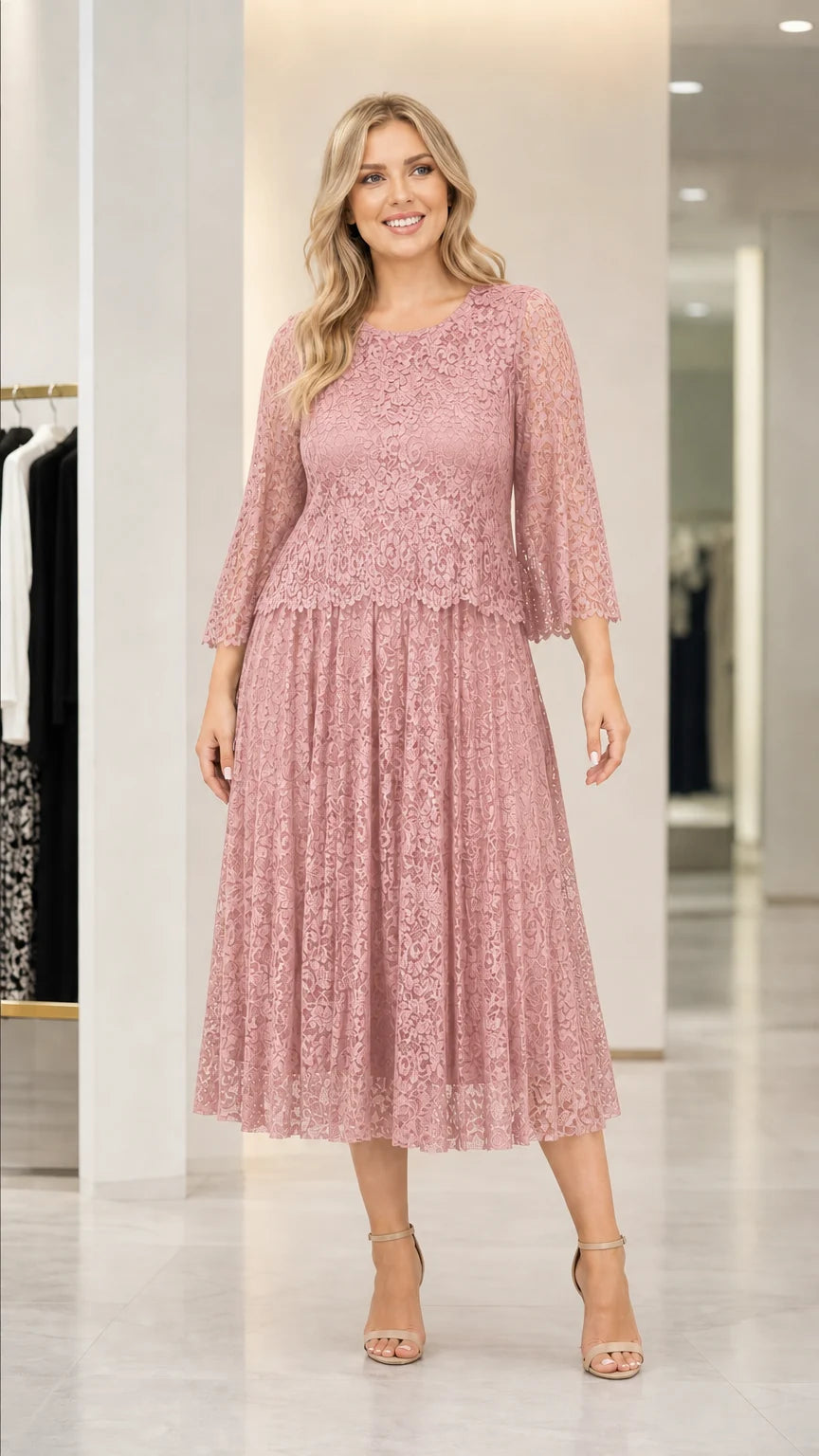 Front view of woman wearing dusty pink lace midi dress