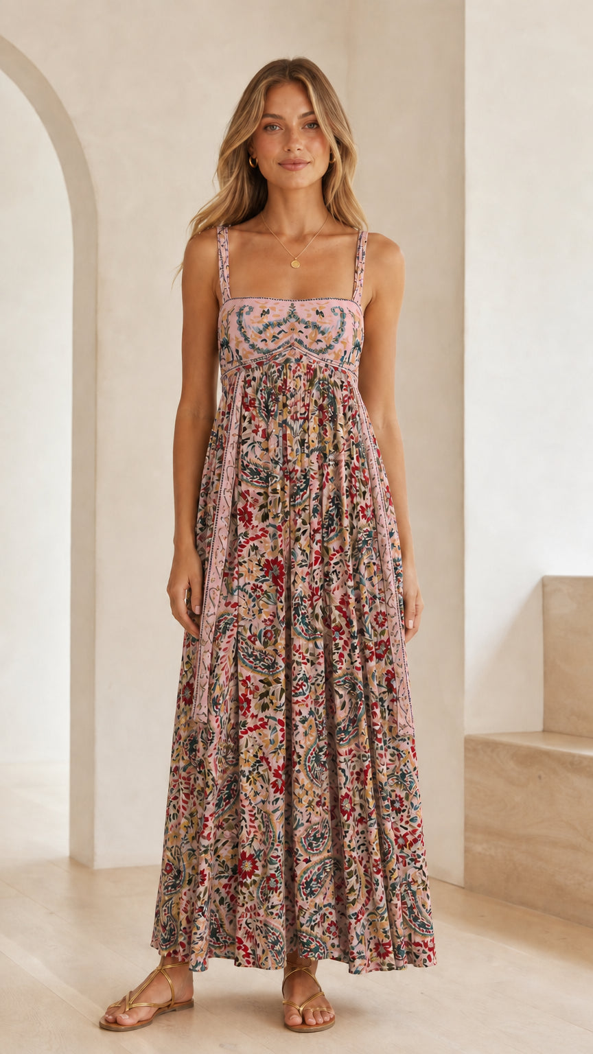 Front view of model wearing dusty pink floral print square neck maxi dress
