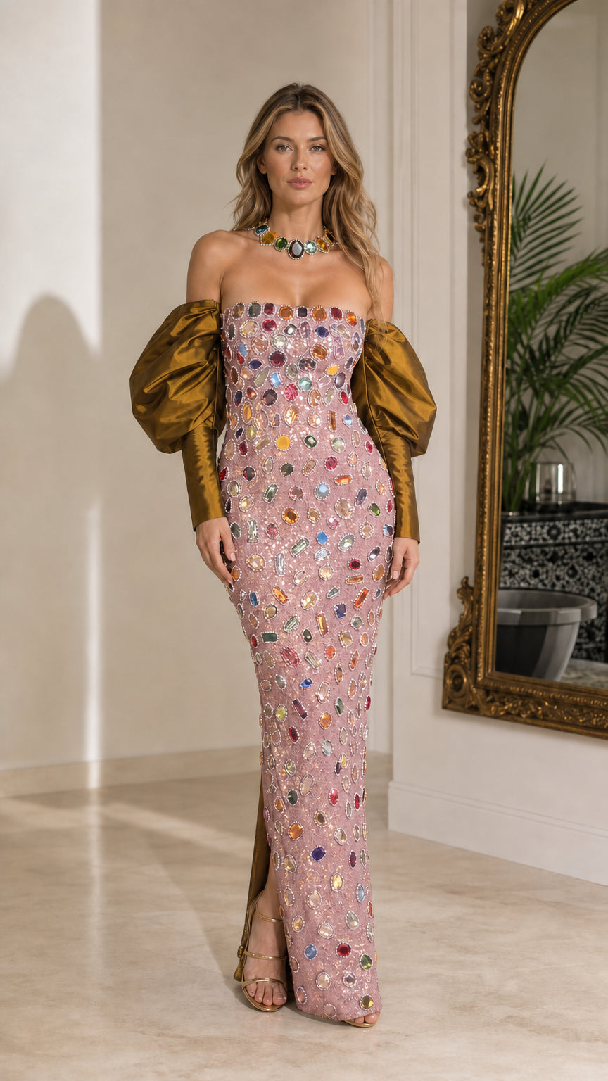 Full-length view of pink crystal embellished maxi gown with bronze puff sleeves
