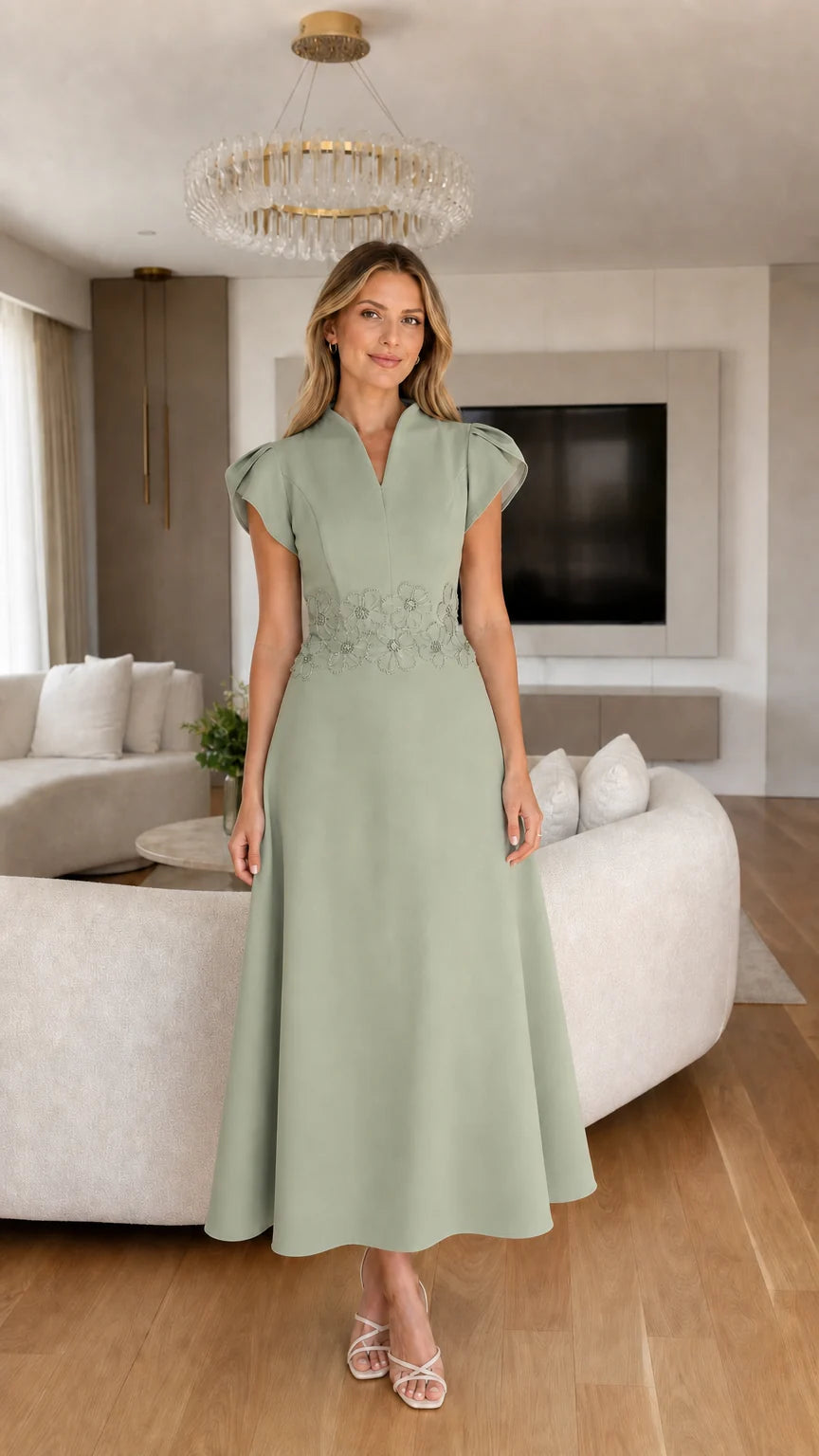 Front view of sage green flared midi dress