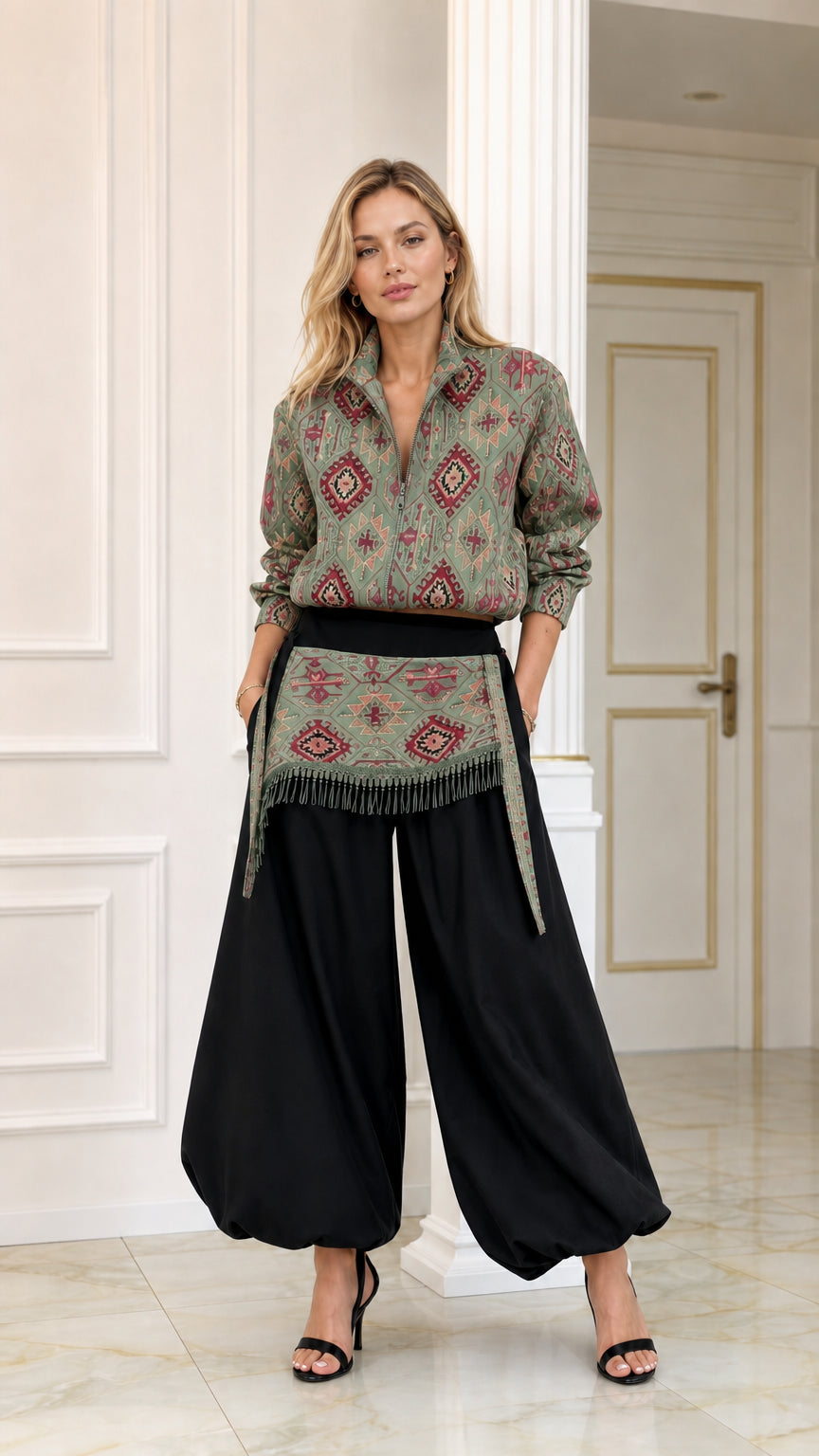 Front view of sage green geometric pattern blouse and black balloon pants two-piece set