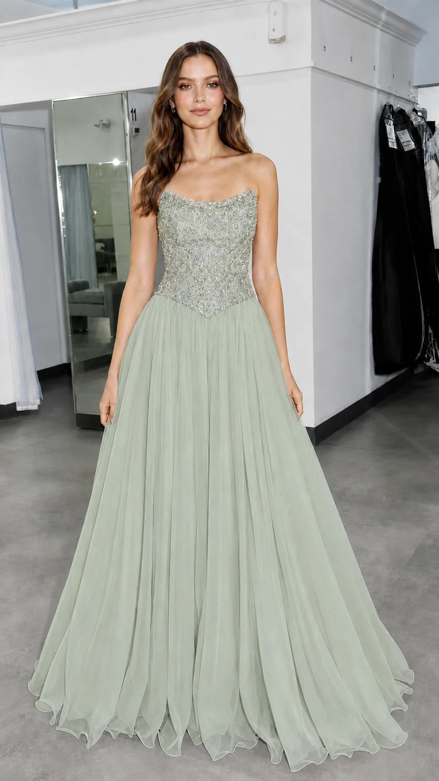 Front view of model wearing sage green formal gown