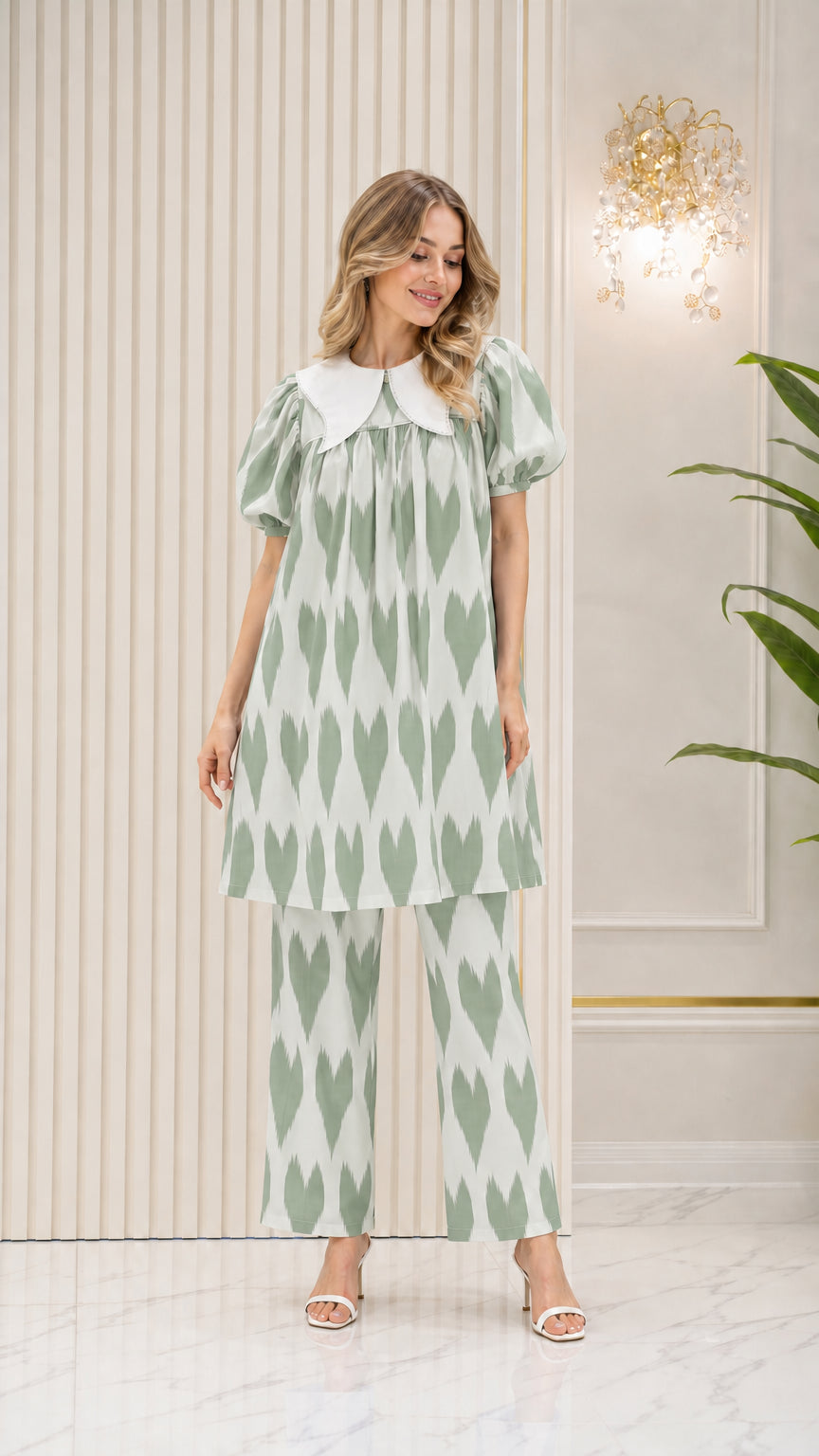 Model wearing Sage Green printed tunic and straight-leg pants set