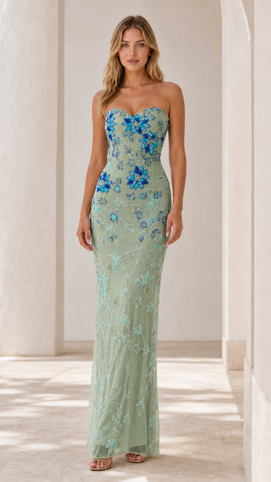 Front view of sage green strapless evening gown with floral beading