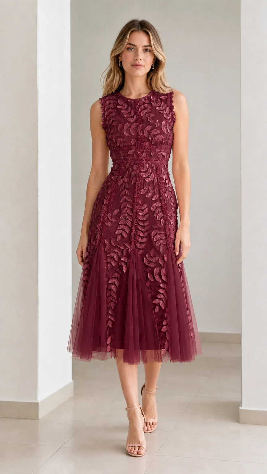 Front view of model wearing burgundy embroidered leaf applique midi dress