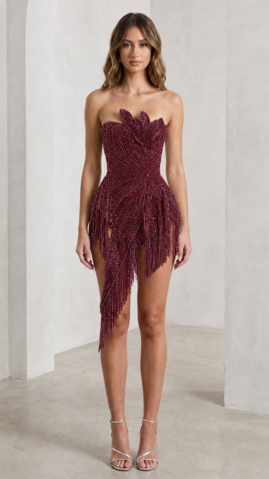 Front view of burgundy strapless beaded fringe mini dress