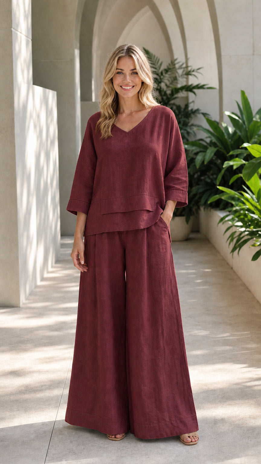 Woman wearing burgundy two-piece wide-leg lounge set