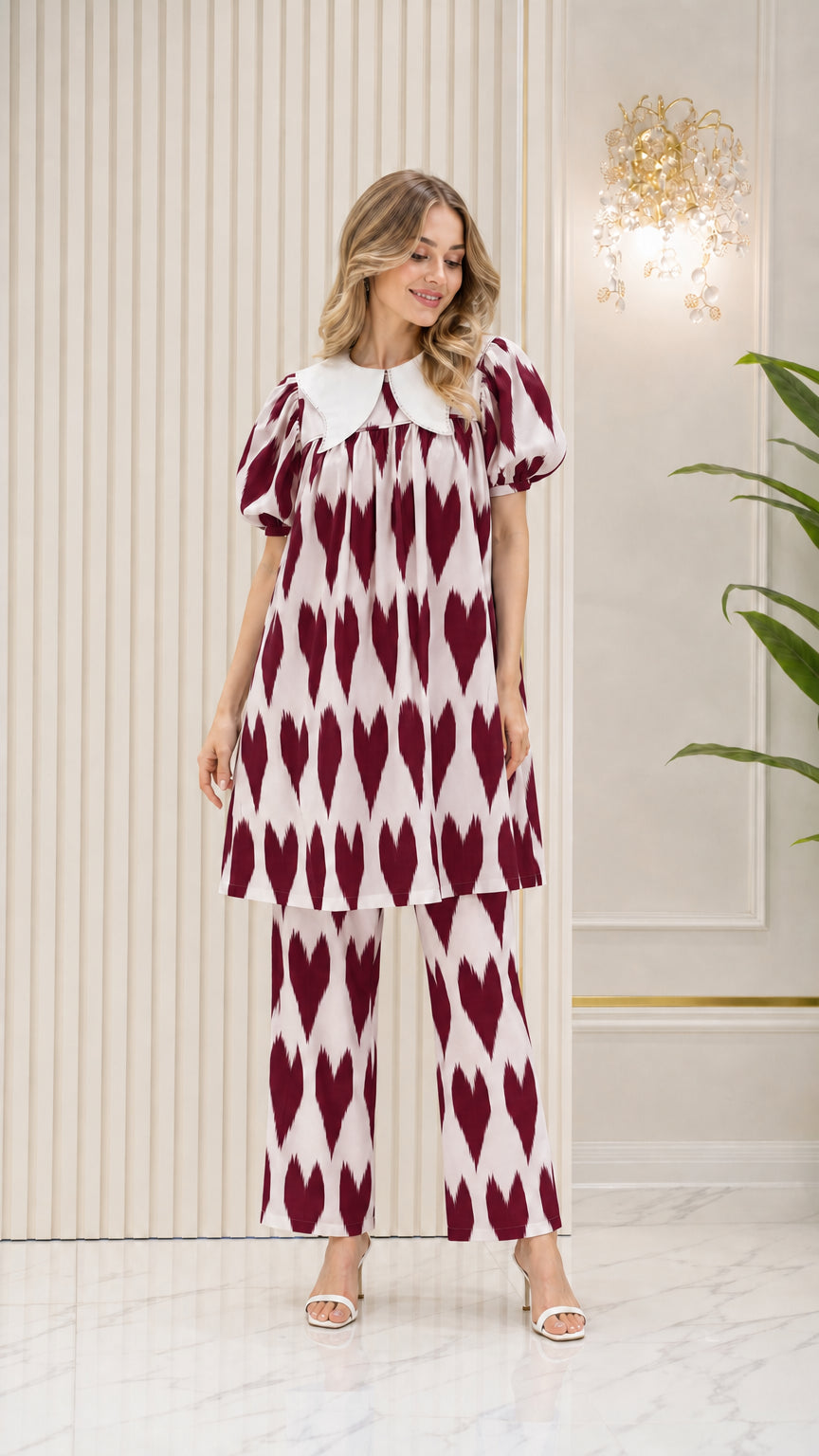 Model wearing Burgundy geometric print tunic top and trouser set