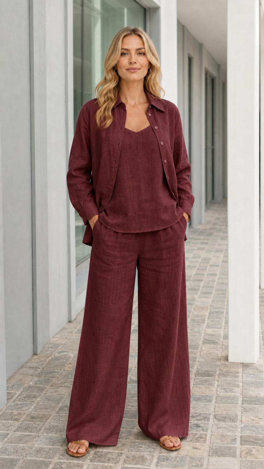 Woman wearing burgundy 3-piece linen style set