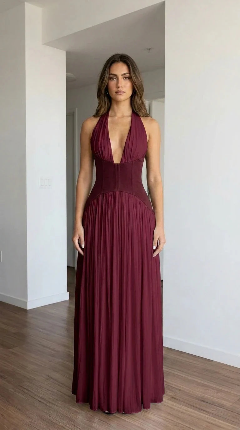 Front view of burgundy halter pleated maxi dress