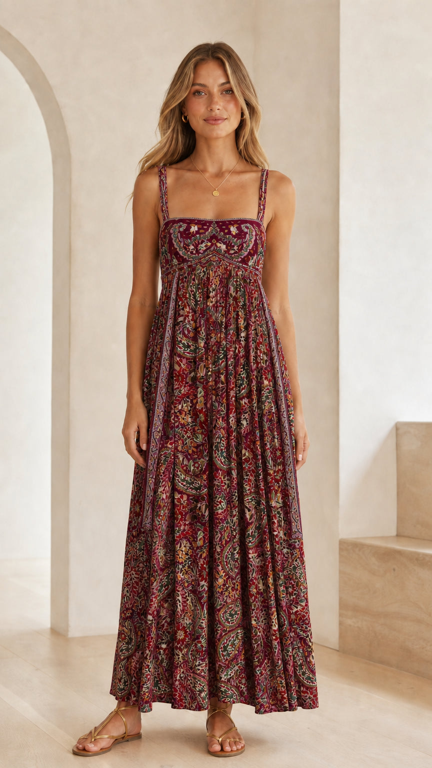 Front view of model wearing burgundy floral print square neck maxi dress