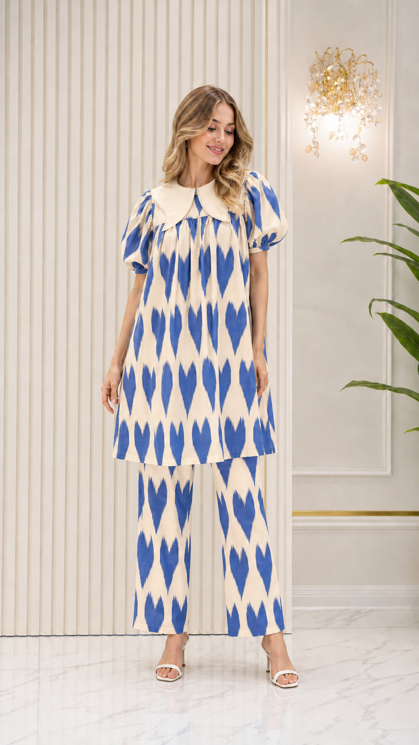Model wearing Navy Blue and cream geometric print tunic and pants set