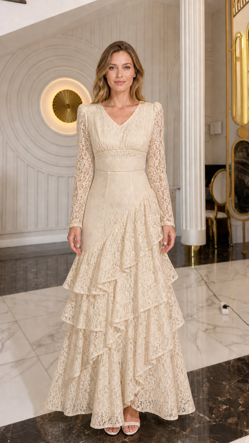 Model wearing champagne beige long-sleeve lace tiered formal dress