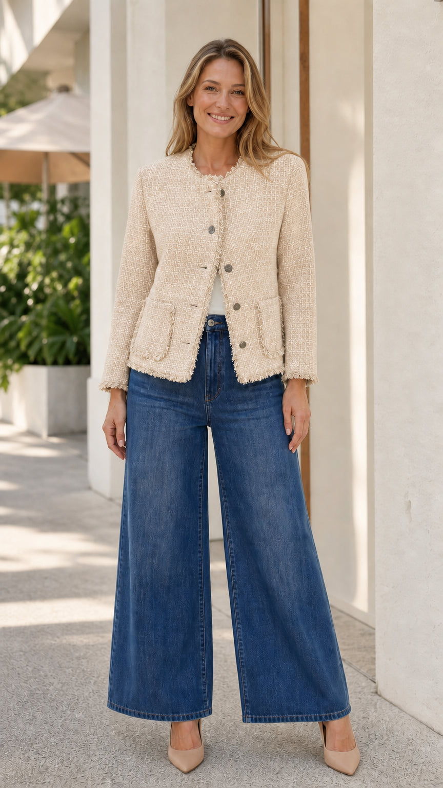 Model wearing beige fringe-trim tweed jacket